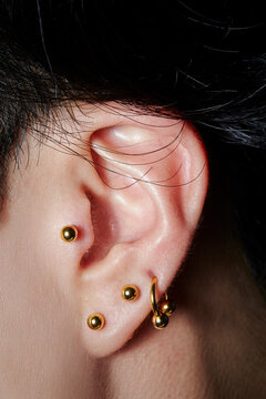 Close up of ear piercing