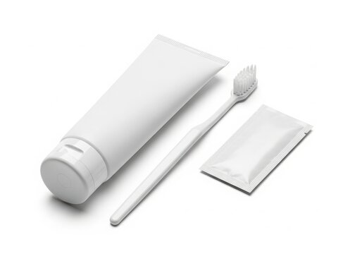 Toothpaste tube with toothbrush and packet isolated on white background