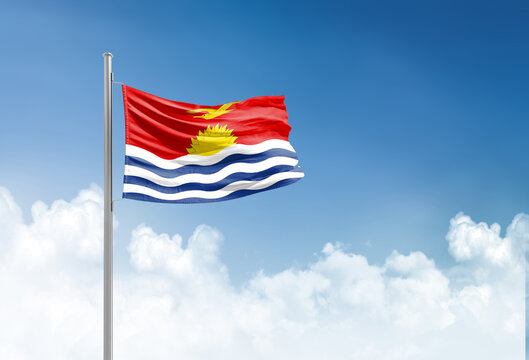 Kiribati flag waving in beautiful sky.