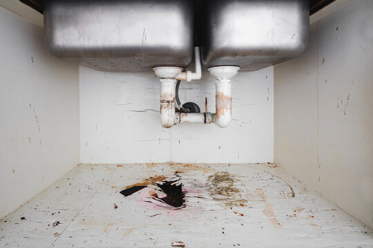 Home problems, Damaged water leak out from piping under sink in the kitchen