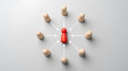 Obraz premium Red wooden pawn surrounded by beige pawns with arrows pointing to the center leader figure.
