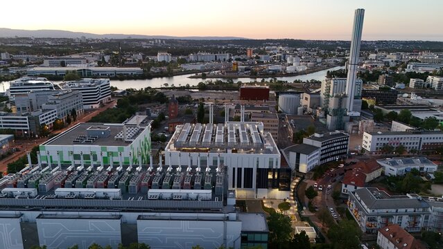 Aerial view of Keppel Data Center Reit featuring modern industrial architecture and technical infrastructure near the river in the urban landscape of Offenbach am Main, Hessen, Germany.