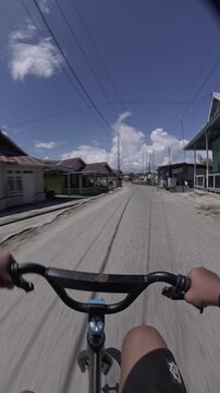 First Person View Riding Bicycle on Village Road