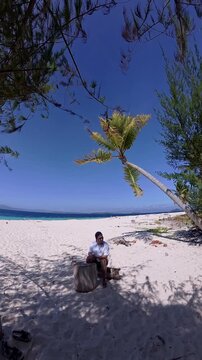 Man Resting on a Tropical Beach