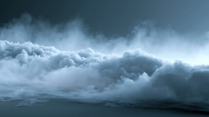 Obraz premium A dramatic cloudy sky with thick white clouds and a dark blue background