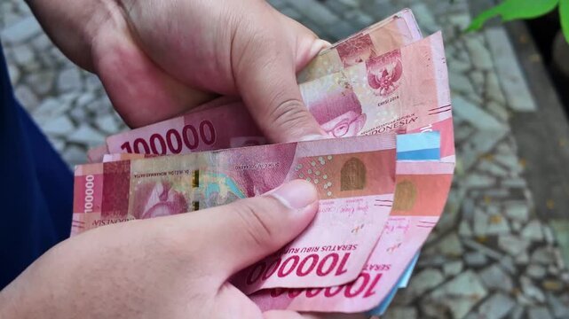money in hand. people counting money for saving.