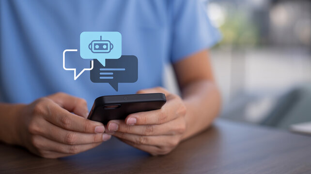 Person interacting with AI chatbot assistant on mobile phone app