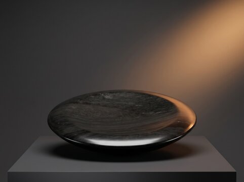 Minimalist black volcanic obsidian sculpture background with glowing podium display pedestal in studio setting.