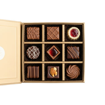 Assorted gourmet chocolates in a square gold gift box, featuring nine distinct handcrafted pralines with fillings, toppings, and decorative patterns on a black background