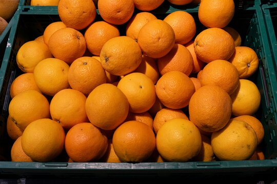 Fresh Oranges in Crate at Supermarket