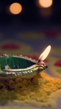 Clay diya lamps lit during diwali celebration, Diwali, or Deepavali, is India's biggest and most important holiday.