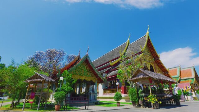 Historic temple complex in Chiang Mai Thailand with traditional architecture and clear sky