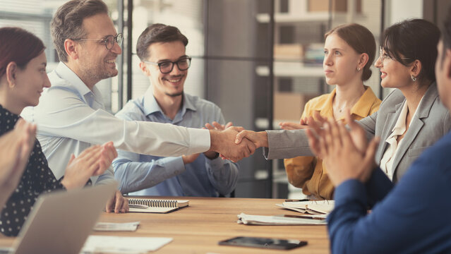 Business handshake in the office