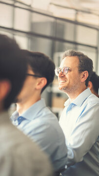 Businesspeople listening to a presentation during a business seminar
