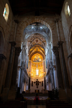 Cefalu, Italy; 1st January 2026: Interior of Cefalu Cathedral in Sicily, featuring the spectacular Christ Pantocrator mosaic in the apse.