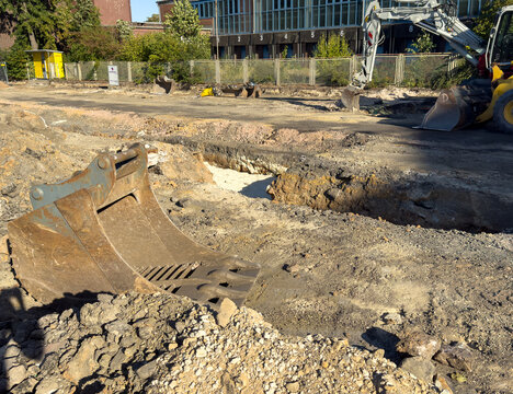 Road Construction Site with Heavy Machinery in the City &ndash; Urban Infrastructure Development and Civil Engineering Concept