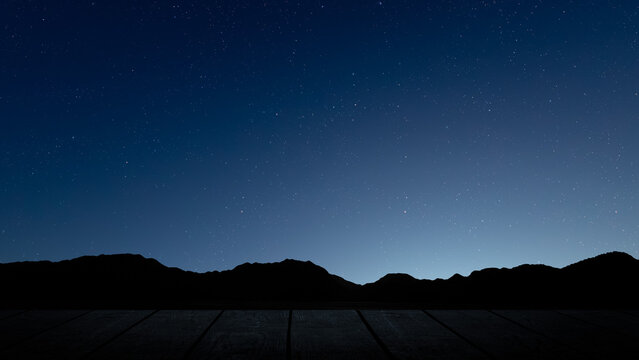 Glowing Christmas star above a peaceful mountain landscape