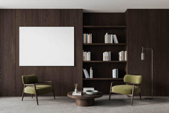 Elegant dark wood living room interior with empty framed poster mockup, bookshelves, lounge chairs, coffee table, and floor lamp. 3D Rendering