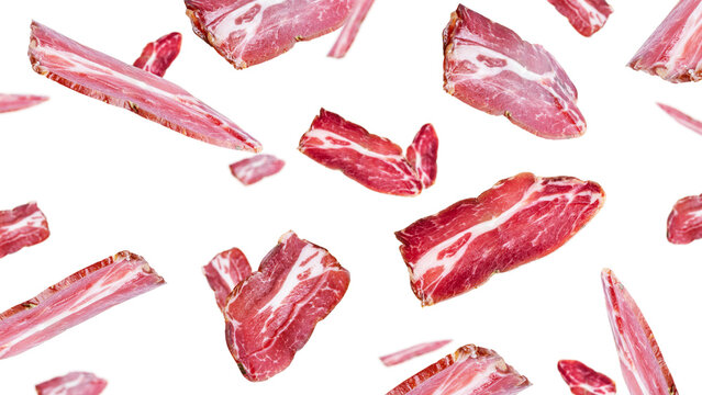 Flying ham slices isolated on white background.