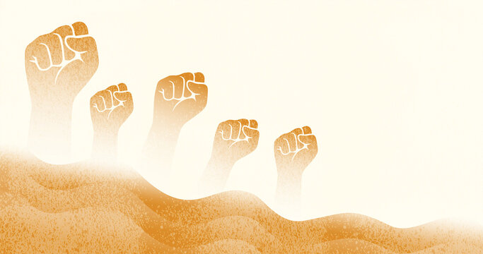 group of human hands raising fists in the desert