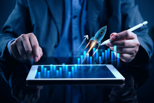 Business Growth Chart and Rocket Launch Concept on Digital Tablet