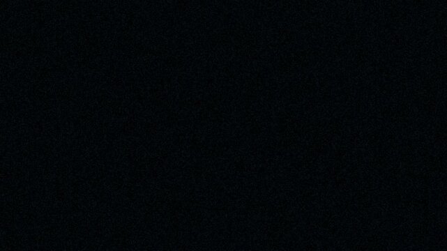 Dark textured background with subtle grainy pattern visible across the entire frame.