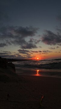 Sunrise Over the Black Sea With Waves and Scattered Clouds