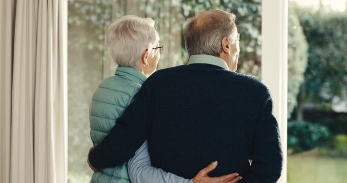 Hug, window and back of senior couple in home with reflection, reminder or memory of retirement. Bonding, embrace and elderly man with woman for nostalgia in marriage with connection in apartment.