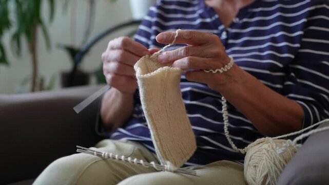 Close-up of woman's hands knitting