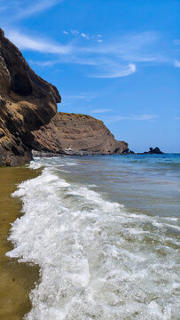 Sea waves on the shore. Rocks on the seashore. Free space for text. waves and rocks. Travel to Agde, France.