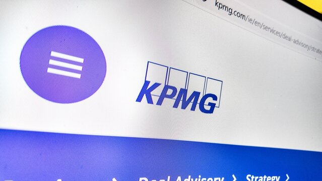  ..a computer screen with KPMG website displayed... KPMG is a British multinational professional services network headquartered in London