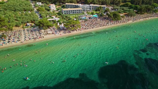 Crowded Sandy Shore of Paralia Pachi Beach, Thasos, Greece