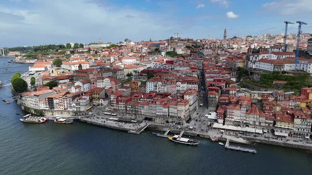 Porto city skyline Douro River and Arr&aacute;bida Bridge aerial view historic architecture and urban landscape in Portugal drone shot cityscape travel tourism
