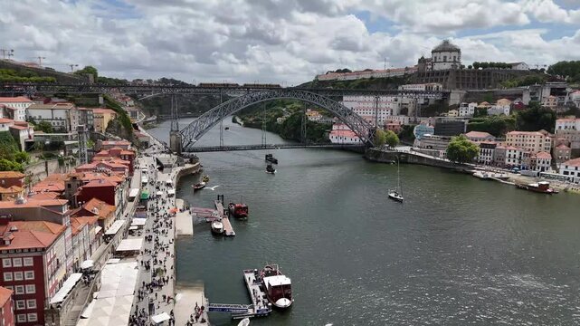 Porto city life and tourism aerial view of the Douro river Dom Lu&iacute;s i bridge and Ribeira district in Portugal cityscape travel urban Europe