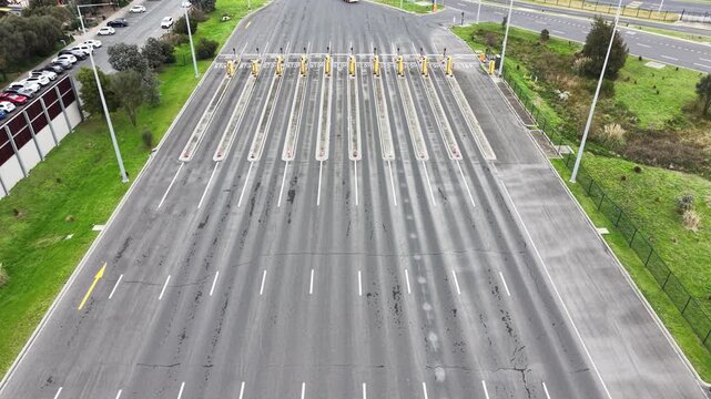 Aerial view of a multi lane toll plaza checkpoint