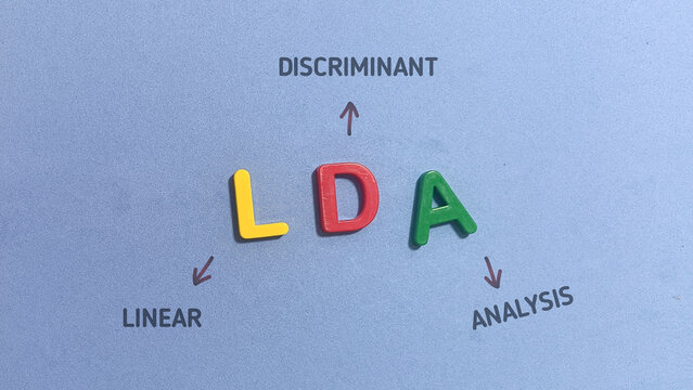LDA Linear Discriminant Analysis machine learning and statistics concept with letter blocks on blue background