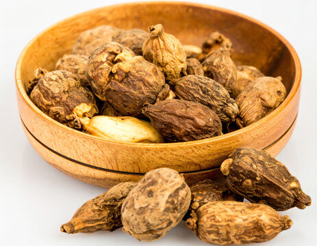 Fresh slices of Butea superba root in a wooden bowl, featuring a natural textured medicinal herb, organic traditional remedy, healthy plant extract, alternative wellness ingredient, botanical