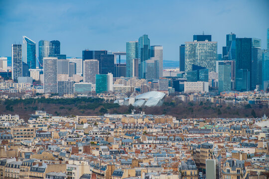 Paris skyline featuring La Defense financial district and rooftops France with copy space