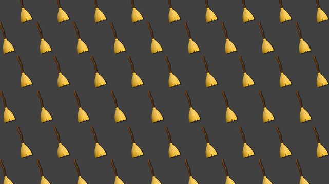 Seamless Pattern of Yellow Triangle Shapes on a Dark Gray Background.