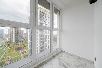 Fototapeta premium Panoramic windows overlooking city high-rise residential district