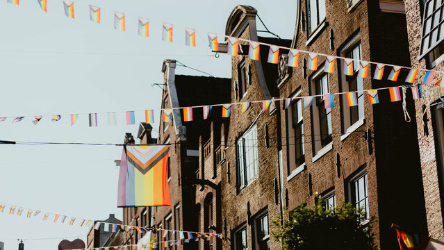 Colorful street decorated for Pride celebration in urban area