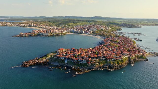 Sozopol old town new city panoramic aerial drone view bay beach coastline Black Sea peninsula sunset light summer vacation travel destination Bulgaria