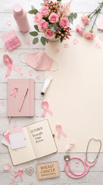 Flat lay with pink flowers, healthcare accessories, notebooks, and awareness symbols arranged with abundant copy space for Pink October, Breast Cancer Prevention Campaign