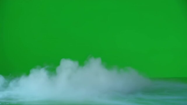 Wispy white smoke elements rising against a green screen backdrop with subtle motion