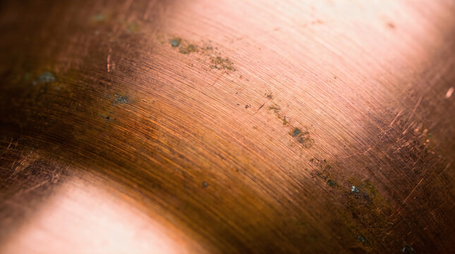 Close up view of scratched copper metal texture