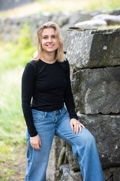 Portrait of beautiful smiling blonde young woman 