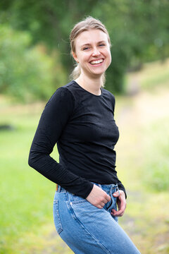 Portrait of beautiful smiling blonde young woman 