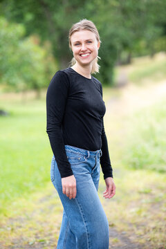 Portrait of beautiful smiling blonde young woman 