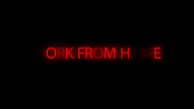 Work from home text glows in red neon lettering on a solid dark background.