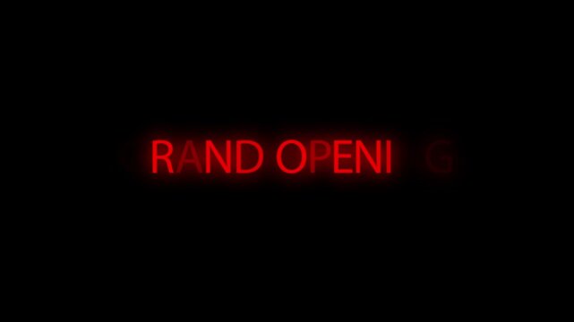 Grand opening announcement displayed with glowing red lettering on black.